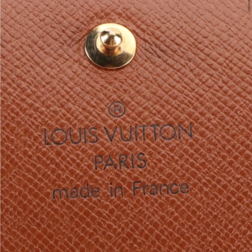 Louis Vuitton Porte Monnaie Wallet in Monogram Canvas
